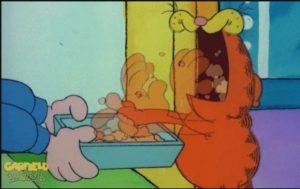 garfield-stuffing-face-with-food